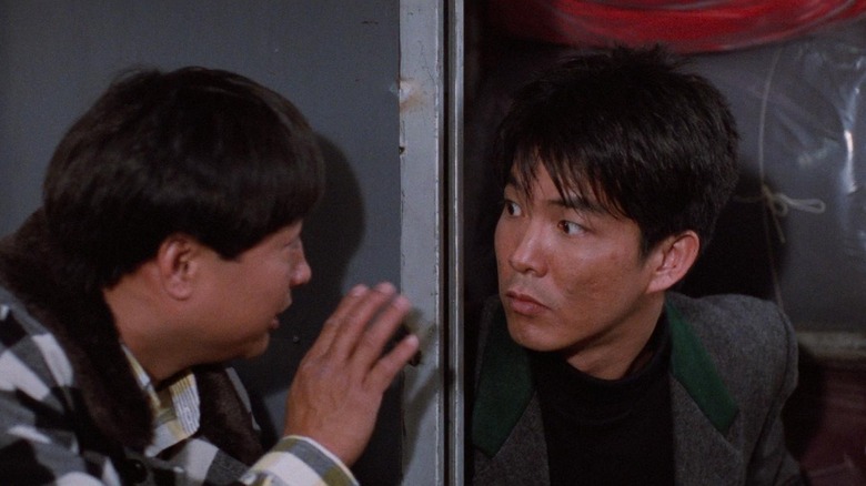 Sammo Hung as Wong and Yuen Biao as Tung, making plans in Dragons Forever