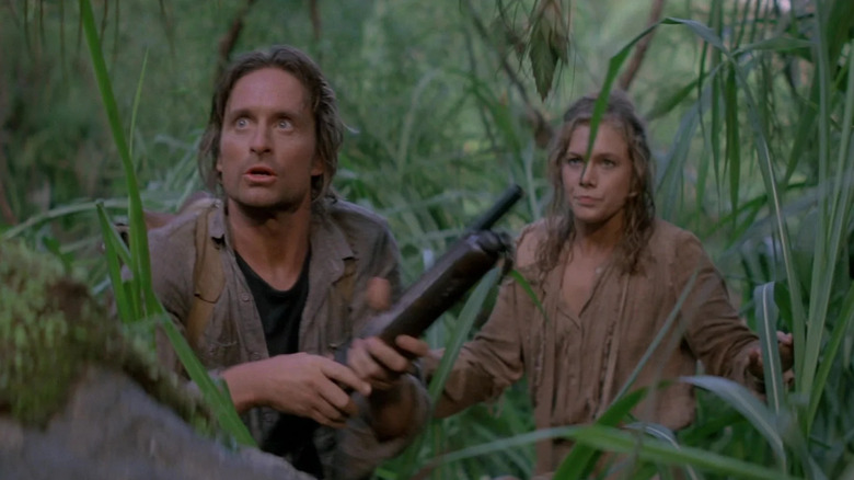 Michael Douglas as Jack and Kathleen Turner as Joan, lost in the jungle in Romancing the Stone