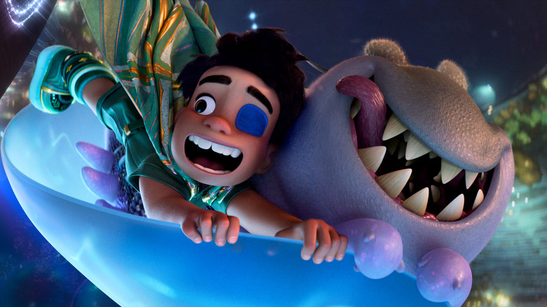 Yonas Kibreab as the voice of Elio and Remy Edgerly as Glordon soaring through the air in Elio