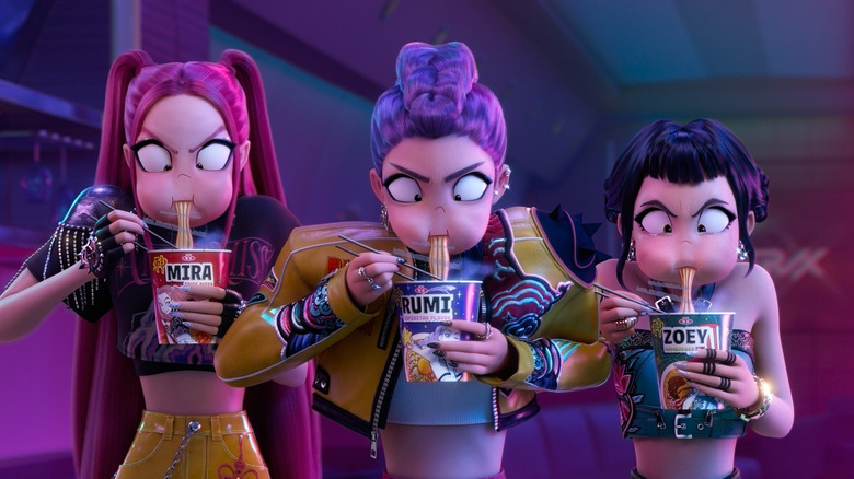 All three members of Huntr/x devouring noodles in KPop Demon Hunters