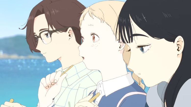 Rui, Totsuko, and Kimi sit near the ocean to write a song in The Colors Within
