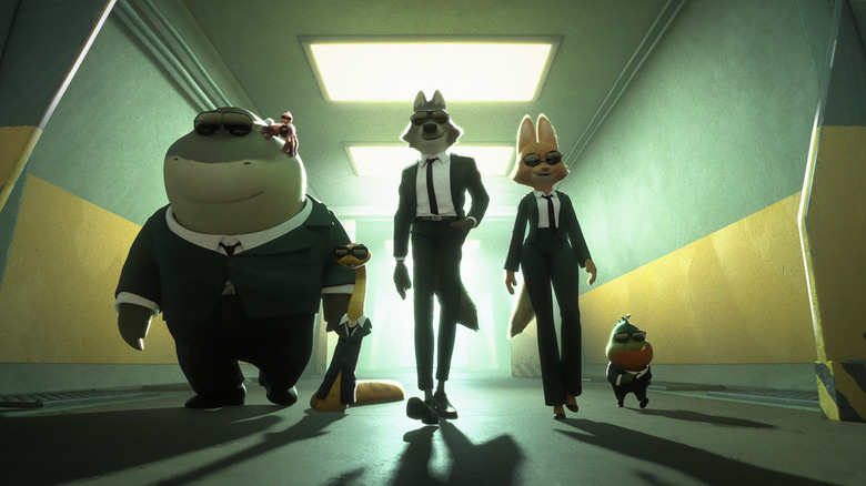 The Good Guys walking down a hallway in suits in The Bad Guys 2