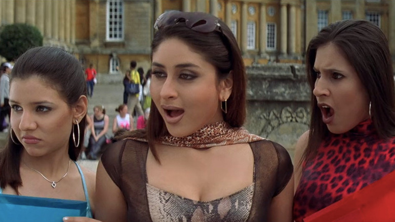 Jeroo Writer as Tanya, Kareena Kapoor as Pooj, and Ramona Sunavala as Sonya with mouths open looking shocked in Kabhi Khushi Kabhie Gham...