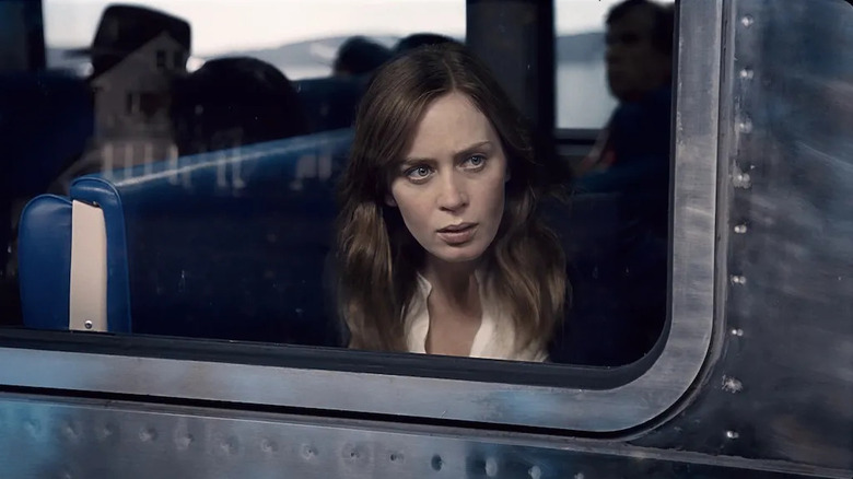 Rachel Watson (Emily Blunt) stares from the window of a train in The Girl on the Train