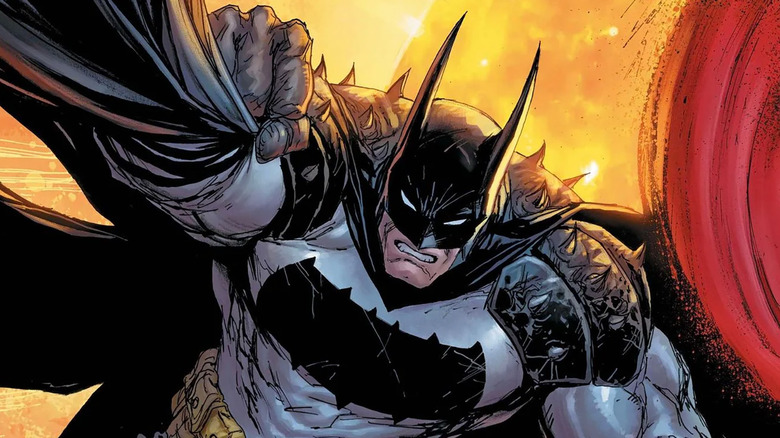 Absolute Batman lunges through fire with his cape