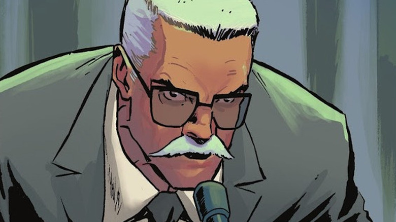 Jim Gordon speaks into a microphone