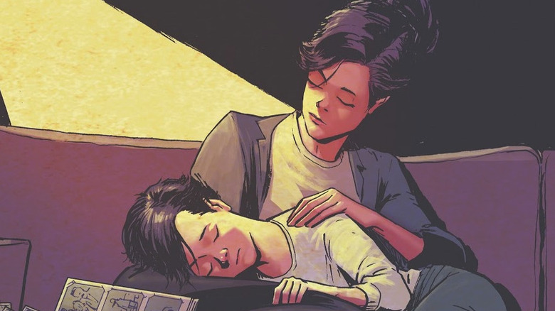 Martha Wayne holds a child Bruce in her lap