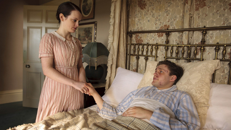 Daisy Robinson (Sophie McShera) comforts a bedstricken William Mason (Thomas Howes) in Downton Abbey