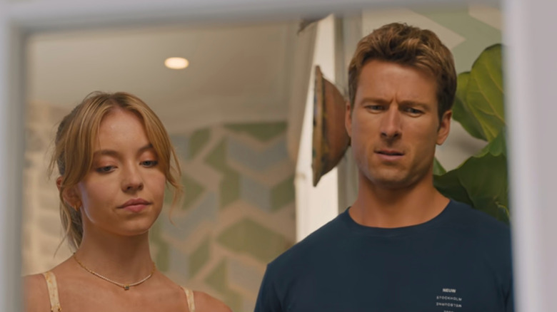 Bea (Sydney Sweeney) and Ben (Glen Powell) frowning in Anyone But You