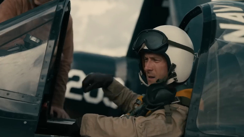 Tom Hudner (Glen Powell) in plane in Devotion