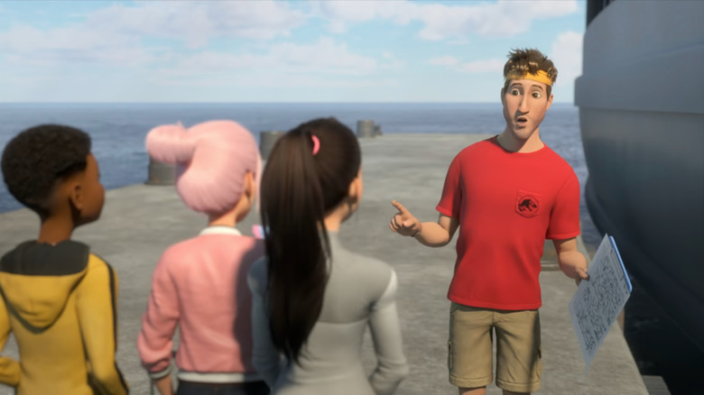 Dave (Glen Powell) talking to campers in Jurassic World: Camp Cretaceous