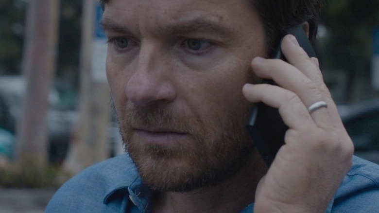 Jason Bateman as Simon, getting a very disturbing phone call in The Gift