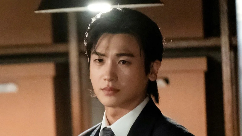 Seo Dong-ju (Park Hyun-sik) stares forlornly in a file room in Buried Hearts