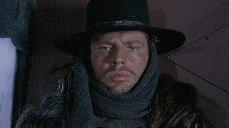 Silence (Jean-Louis Trintignant) glares intently in The Great Silence