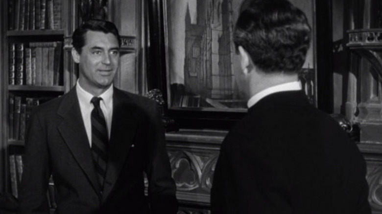 Dudley (Cary Grant) speaks with Bishop Henry Brougham (David Niven) in his office in The Bishop's Wife
