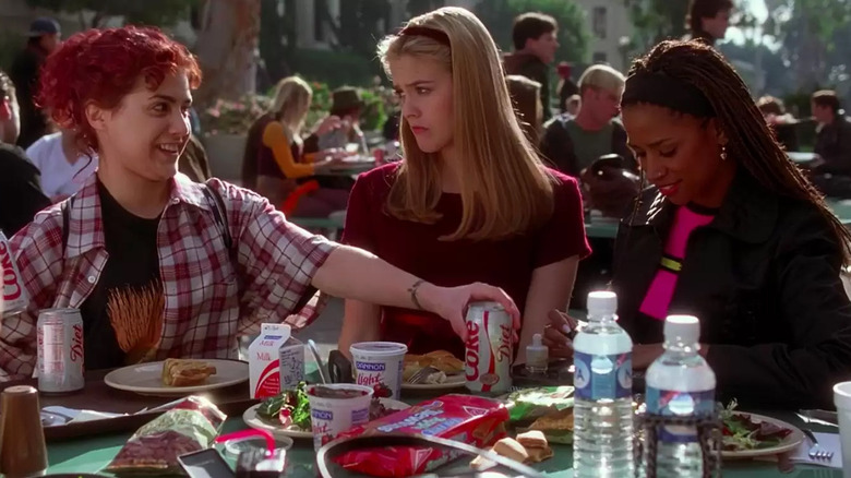Stacey Dash and Alicia Silverstone as Dionne and Cher walking outside school in Clueless