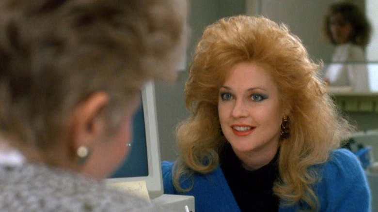 Melanie Griffith as Tess McGill in the office in Working Girl