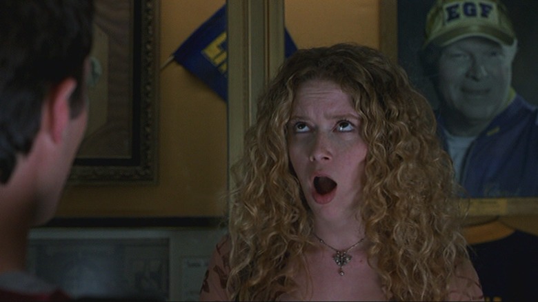 Natasha Lyonne with mouth open wide in American Pie