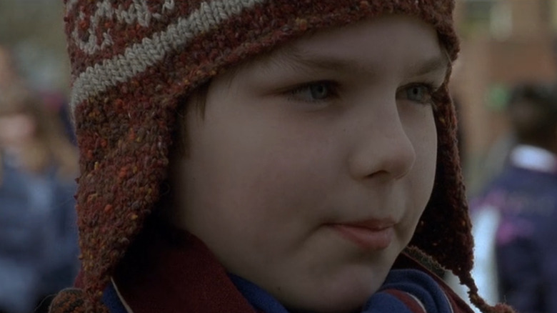 Nicholas Hoult as Marcus Brewer in the school yard in About a Boy.