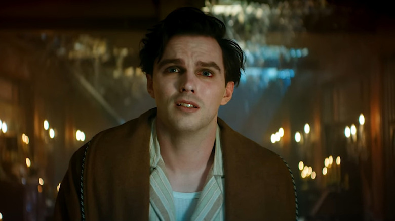 Nicholas Hoult as Renfield looks pleading in Renfield.