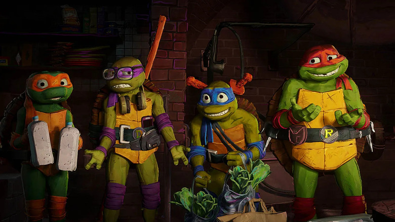 The Teenage Mutant Ninja Turtles carry groceries into the sewer in Teenage Mutant Ninja Turtles: Mutant Mayhem