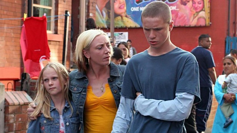 Kelli Hollis as Tina Crabtree walking with her kids in Mischief Night