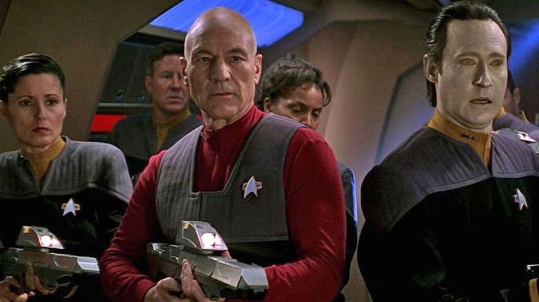 Jean-Luc Picard (Patrick Stewart) and Data (Brent Spiner) lead an armed crew in Star Trek: First Contact