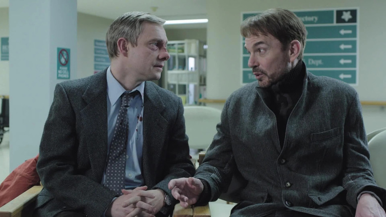 Lorne Malvo (Billy Bob Thornton) speaks to Lester Nygaard (Martin Freeman) in a hospital waiting room in Fargo