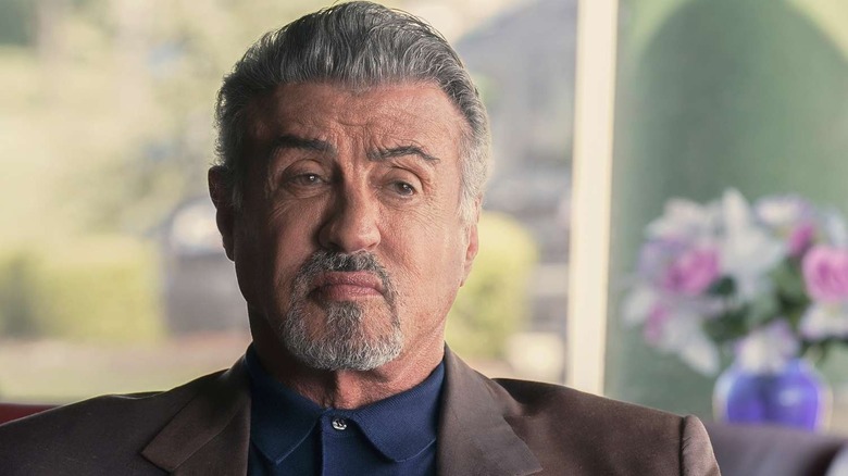 Dwight Manfredi (Sylvester Stallone) sits stoically in Tulsa King