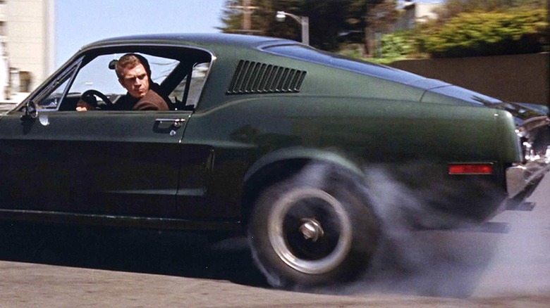 Steve McQueen as Bullitt, in a car chase in Bullitt