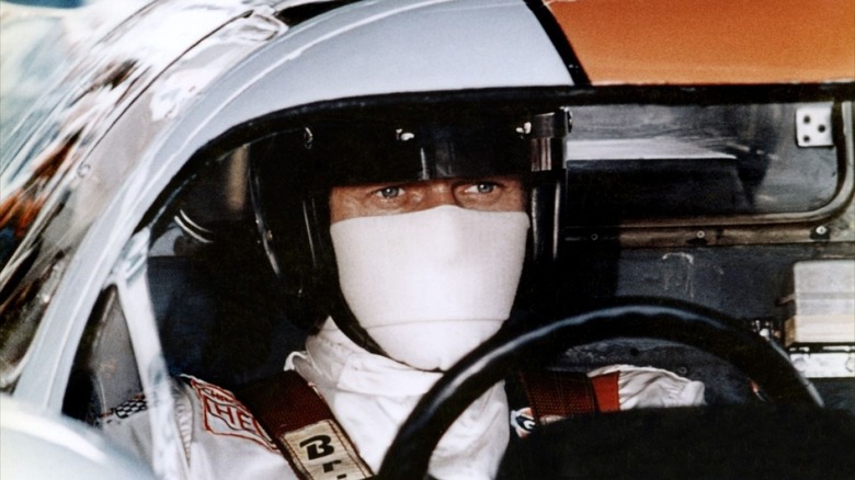 Steve McQueen as Delaney, ready to race in Le Mans
