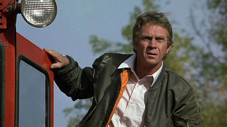 Steve McQueen as Papa, looking for bad guys in The Hunter