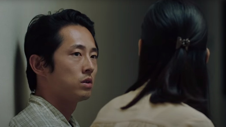 Jacob (Steven Yeun) talks to his wife Monica (Han Ye-ri) in Minari