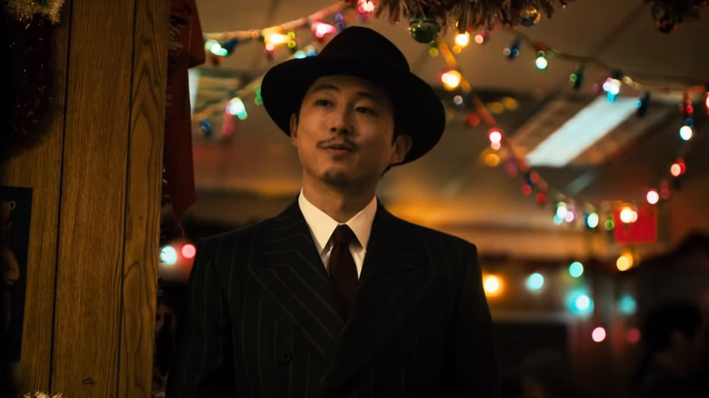 A Traveler (Steven Yeun) charms in The Twilight Zone episode A Traveler.