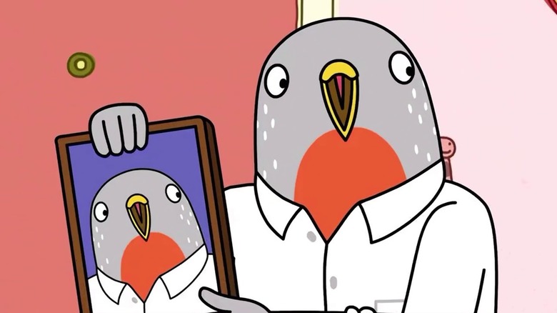 Speckle (Steven Yeun) holds a picture of himself in Tuca & Bertie