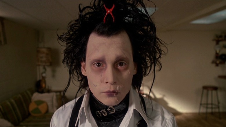 Edward (Johnny Depp) with a clip in his hair in Edward Scissorhands