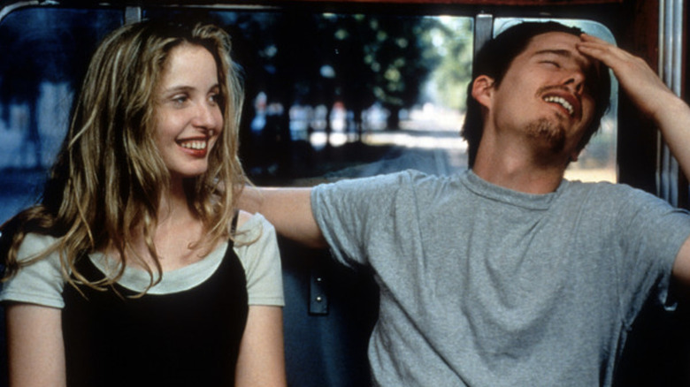 Jesse (Ethan Hawke) and Celine (Julie Delpy) laugh in Before Sunrise