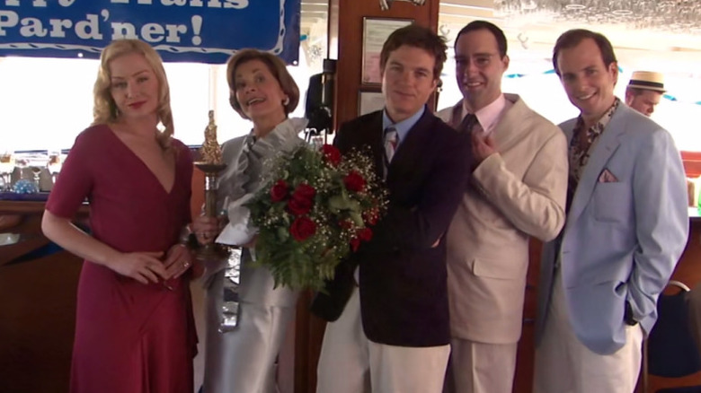 Portia de Rossi, Jessica Walter, Jason Bateman, Tony Hale, Will Arnett as Lindsay, Lucille, Michael, Buster, and Gob standing together in Arrested Development