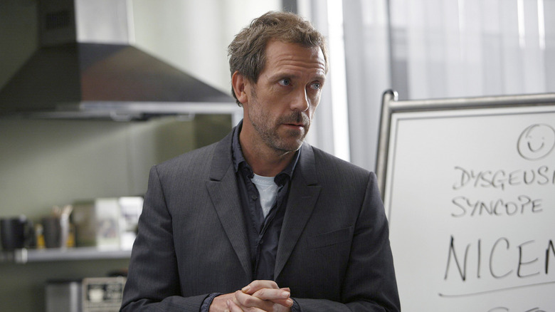 Dr. House (Hugh Laurie) looking grumpy on House
