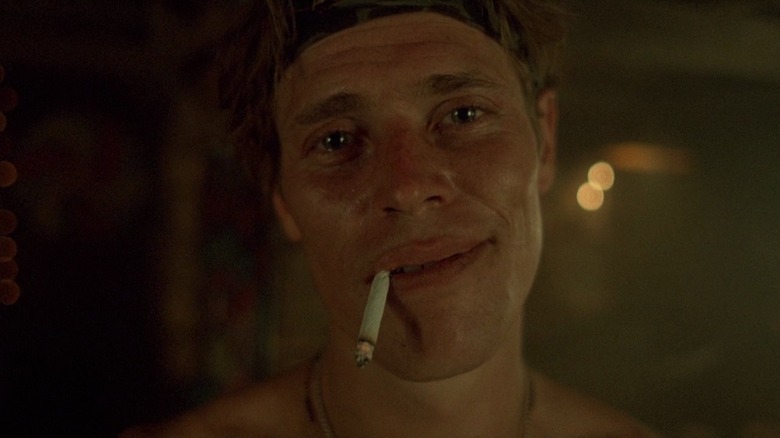 Sgt. Elias (Willem Dafoe) smokes a cigarette in Platoon