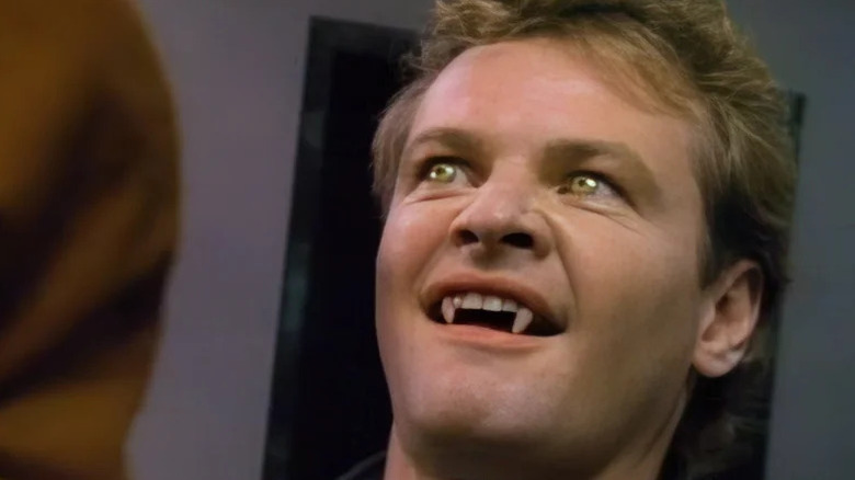 Geraint Wyn Davies as Nick Knight with fangs and yellow eyes in Forever Knight