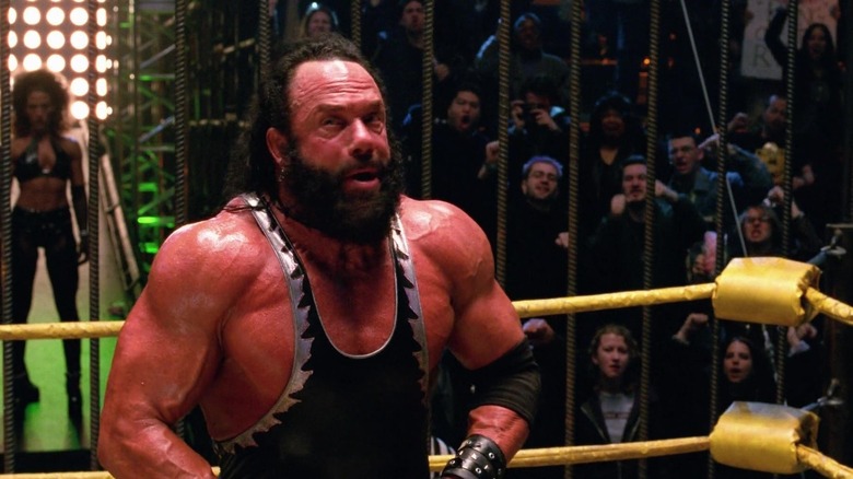 Randy Savage's Bone Saw McGraw gesturing in Spider-Man
