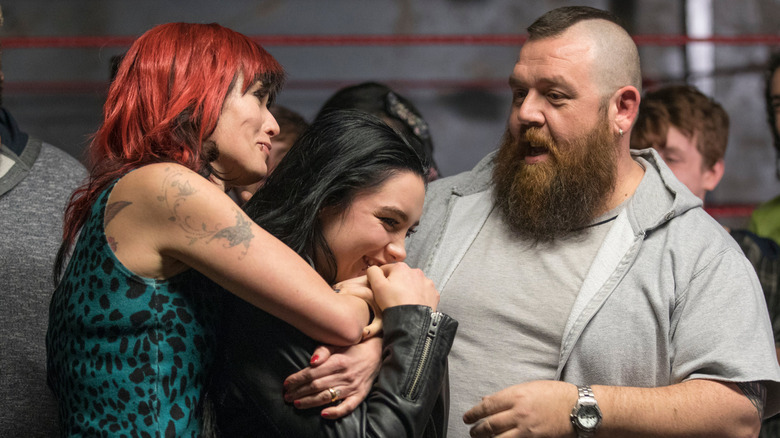 Saraya (Florence Pugh) celebrates with her parents (Lena Headey and Nick Frost) in Fighting With My Familyy