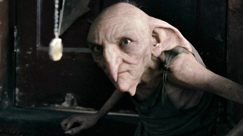 Simon McBurney as Kreacher stares at a locket in Harry Potter and the Deathly Hallows