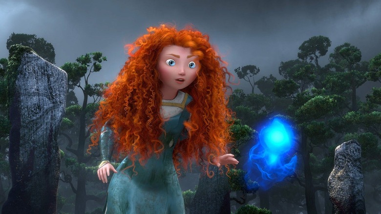 Merida looking at a glowing blue material in Brave