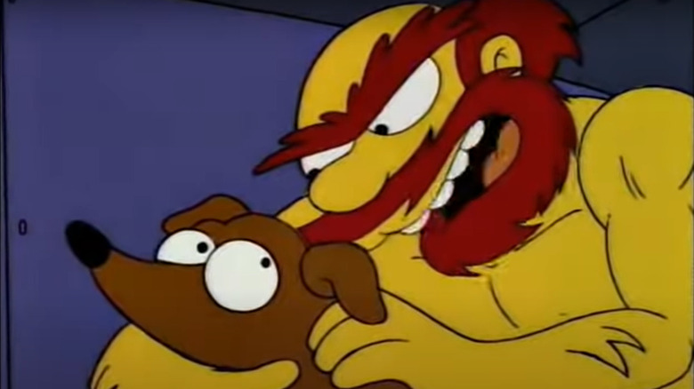 Groundskeeper Willie holding Santa's Little Helper