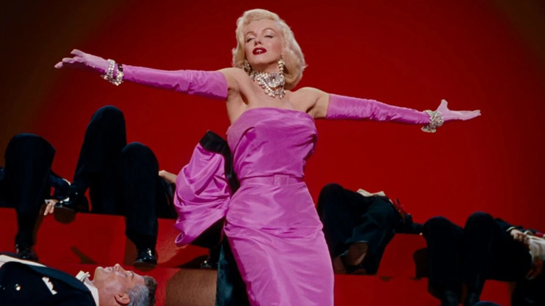 Lorelei Lee (Marilyn Monroe) singing "Diamonds are a Girl's Best Friend" in her iconic pink dress in Gentlemen Prefer Blondes (1953).
