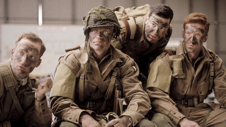 Rick Warden, Neal McDonough, Ron Livingston, and Damian Lewis as soldiers in Band of Brothers