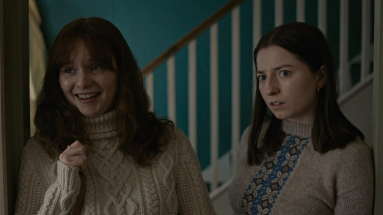 Dolours (Lola Petticrew) and Marian (Hazel Doupe) reacting to parents in Say Nothing