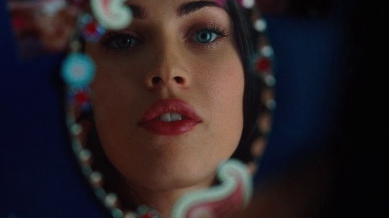 Megan Fox looking in mirror
